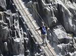 Walk across Trift Bridge, Switzerland 