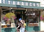 Drink coffee at the  First Starbucks, Pikes Place, Seattle