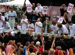 Attend Nathan's Hot Dog Eating Contest, Jericho, New York
