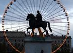 Ride the Farris Wheel at Place Bellecour, Lyon, France