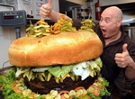 Eat the 10 lbs. Monster Burger at Mallie's Sports Grill & Bar, Southgate, Michigan
