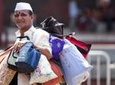 Morning Life of Mumbai's Dabbawalas and Dhobis Tour