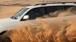 Evening Desert Safari With BBQ Dinner, Camel Ride and Sand Boarding