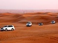 Dubai Desert Safari with BBQ Dinner, Sand Boarding,Camel Ride & 3 live Shows