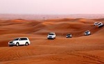 Dubai Desert Safari with BBQ Dinner, Sand Boarding,Camel Ride & 3 live Shows