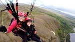 Tandem Paragliding over the Rugged Lava Fields at Blue Mountains