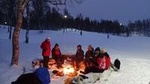 Snowshoe trip with a campfire in Tromso