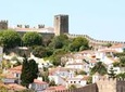 Private Tour: The best of 3 cities: Fatima (Sanctuary), Nazaré (Big Waves) and Obidos (medieval)