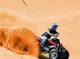Half-Hour Quadbike ride with Dune bashing,Sand Boarding, Dinner and Live Shows