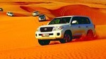 Morning Abu Dhabi Desert Dune Bashing and Camel Ride