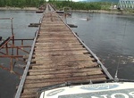 Drive across Vitim River Bridge, Siberia, Russia