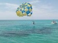 Parasailing Snorkeling and Glass Boat Adventure in Negril