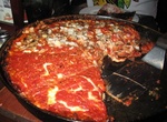 Eat Pequod's Pizzeria, Chicago, Illinois