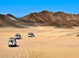 Super Desert Safari (4WD, Quad Bike, Camel Ride, BBQ Dinner & Drinks) 