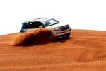 Evening Red-Dunes Desert Safari In Dubai with BBQ Dinner & Dune Bashing