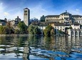 The romantic village of Orta San Giulio with a tour guide