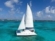 Catamaran Sailing Experience & Snorkeling Tour to Isla Mujeres