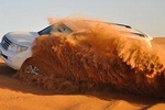 Extreme Desert Safari Evening with Sandboarding, Camel Ride & BBQ Options