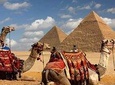 Giza pyramids sunset camel ride with local dinner 