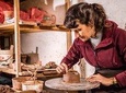 Make artisan chocolate , chicha de jora and ceramic ornaments with local experts