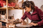 Make artisan chocolate , chicha de jora and ceramic ornaments with local experts