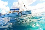 Discover Isla Mujeres with this tour with snorkel, buffet and open bar 
