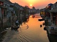 Private Fengjing and Xitang Water Town Sunset Boating Tour with Dinner from Shanghai