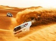 Dubai Morning Safari: Red Dunes, Camel Ride and Sand boarding