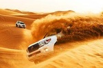 Dubai Morning Safari: Red Dunes, Camel Ride and Sand boarding