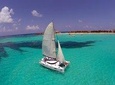 Amazing Tour to Isla Mujeres in a Catamaran with Open Bar