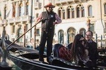 Venice: Gondola ride on Grand Canal with music and dinner