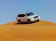 Dubai Red Dune Safari with BBQ Dinner & Live Shows from RAK