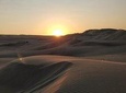 (Private) Sunrise Desert Safari Dune bashing, Camel ride and sand boarding .