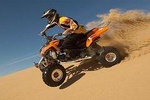 Half-hour Quad Bike Ride, Safari with BBQ Dinner & Camel Ride 
