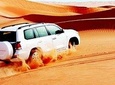 Dubai Red Dunes Safari: BBQ dinner, Sandboarding & Camel Ride pick up from RAK