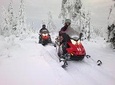 Snowmobile Safari in the Forest