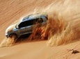 Evening Desert Safari with Dune Bashing, Camel Riding, BBQ Dinner