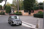 Beautiful neighbourhoods of Rome Tour by Mini Vintage Cabriolet , special drink stopover included