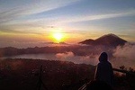 Watch the sunrise from the top of Mount Batur volcano