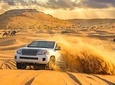 Desert Safari with Quad Bike Sand Boarding and a Camel Ride