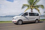 Private Round Trip Transfer: Liberia Airport to Playa Grande with Free Drinks
