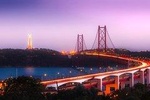 Private Premium Car Transfer from Huelva to Lisbon with 2 Sightseeing Stops