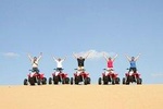 Dubai Red Dunes Safari by Quad Bike, Sand boarding, Camel Ride & BBQ Dinner