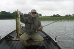 Pike fishing by boat.Lough Corrib,Connemara.English/French speaking Ghillie