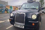 Official Black cab taxi tour of Belfast famous murals and political history