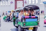 Bangkok in Motion: City Tour by Skytrain, Boat and Tuk Tuk