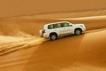 Private Desert Safari Red Dunes with BBQ,Camel Ride,Sand Boarding,Live Shows