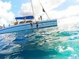 Isla Mujeres tour in a Catamaran with snorkel, open bar, lunch and beach club.
