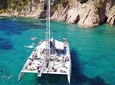 Sailing along the Costa Brava in a big Catamarán with buffet-barbacue and bathing inlet. Drinks included.