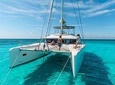 Catamaran tour to Isla Mujeres, Open bar, Lunch, Snorkeling, Beach Club Included